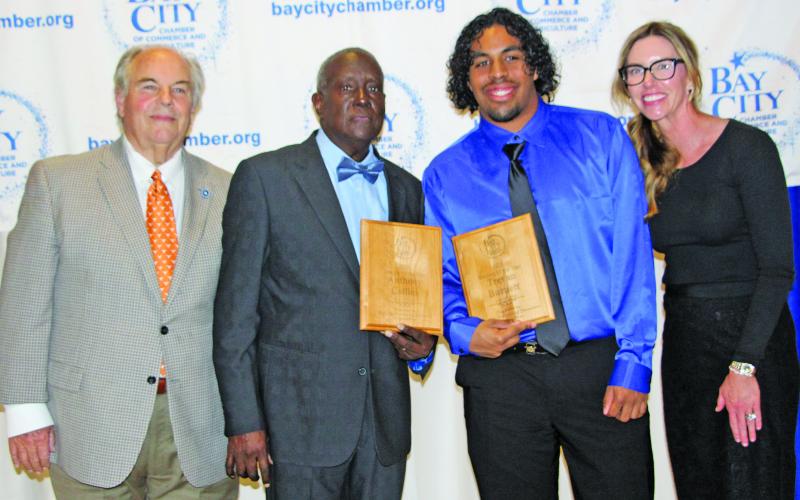 Sentinel Photo/Jessica Shepard Bay City ISD Educator and Student of the Year were recognized at the Bay City Chamber of Commerce &amp; Agriculture at its banquet Jan. 15. Bay City ISD Educator of the Year Anthony Collins, and Bay City High School’s Student of the Year, Trevan Burnett. Shown with Collins and Burnett are outgoing board chair John Dickerson and Chair-elect Savannah Cornelius.