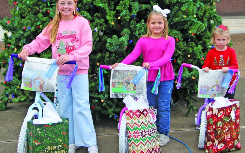Sentinel Photo/Mike Reddell These three girls are the winners in the Bay City Sentinel’s Annual Christmas Coloring Contest. They are, from left: Hayden Jones, 9-12 age category; Kate Bartek, 5-8 category; and Brynn Mach, 2-4 category.