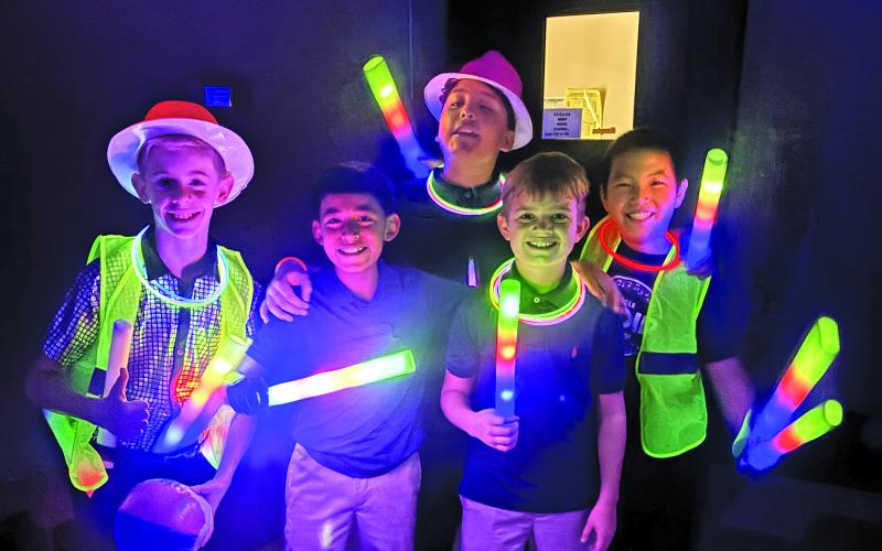 Holy Cross Catholic School 5th Grade boys- Bowen Tomek, Kavi Howard, Casen Saha, Erin Lin, and Julian Lopez had a blast celebrating the groovy 70s at the blackout dance party!  Holy Cross Catholic School Photo