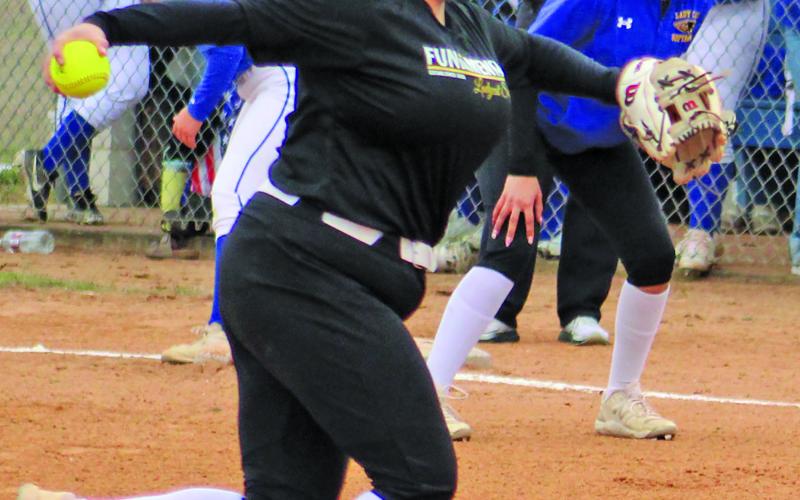 Bay City pitcher focuses on her strike zone against Tigerette.