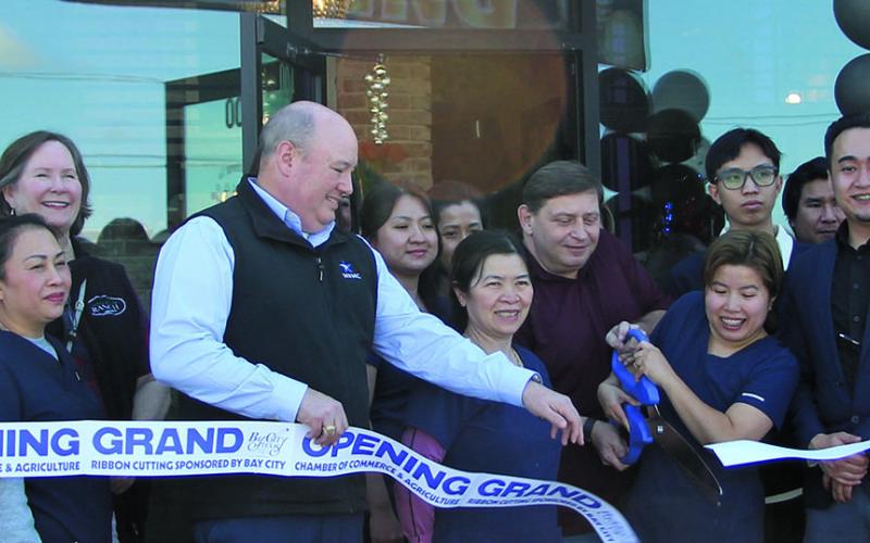 Sentinel Photo/Jessica Shepard Nail Spa Ribbon Cutting: Ann's Nails &amp; Spa partnered with the Bay City Chamber of Commerce &amp; Agriculture for a grand opening ribbon-cutting ceremony for its new location on Thursday, Jan. 29. The spa is located at 4020 7th Street in Bay City.