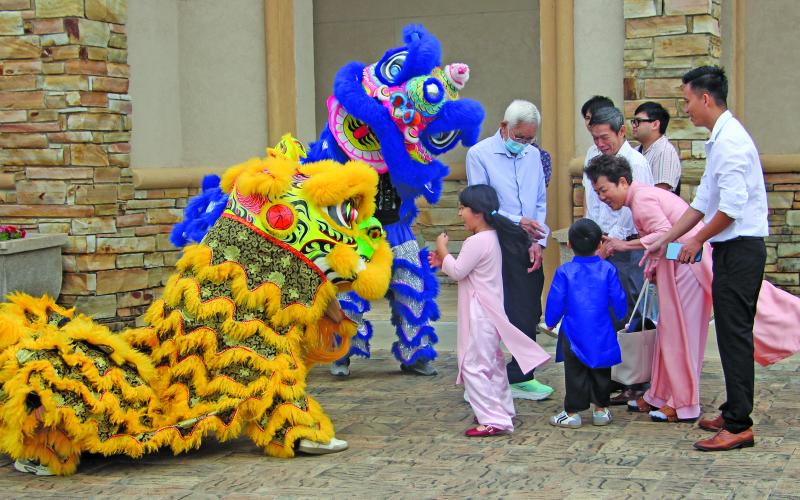 Sentinel photo/Jessica Shepard Palacios residents celebrated the Lunar New Year with a variety of traditional fanfare on Saturday, Feb. 14. The dragon and lion dancers symbolically drove away bad luck from the previous year and ushered in goodwill for 2026 at Our Lady of La Vang Catholic Church.