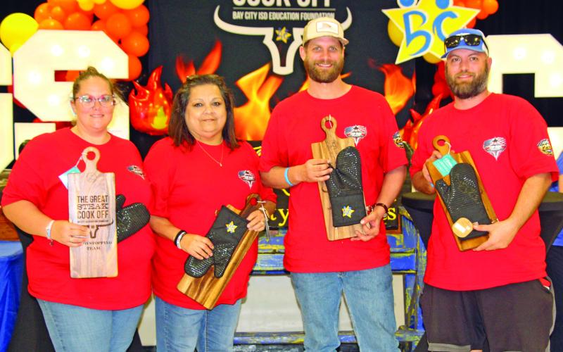 Sentinel Photo/Jessica Shepard “Top Gun Cookers” claimed the “Showstoppers/Best Décor” award for their decorated tent at BCISD Education Foundation’s “Annual Great Steak Cook Off” on March 21.