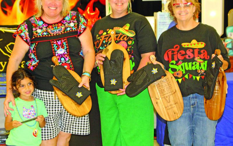 Sentinel Photo/Jessica Shepard This year’s BCISD Education Foundation Annual Great Steak Cook Off “High Stakes Raisers” award went to the “Shaking Things Up” cook-off team on Saturday, March 21. The team raised over $2,300 in donations.