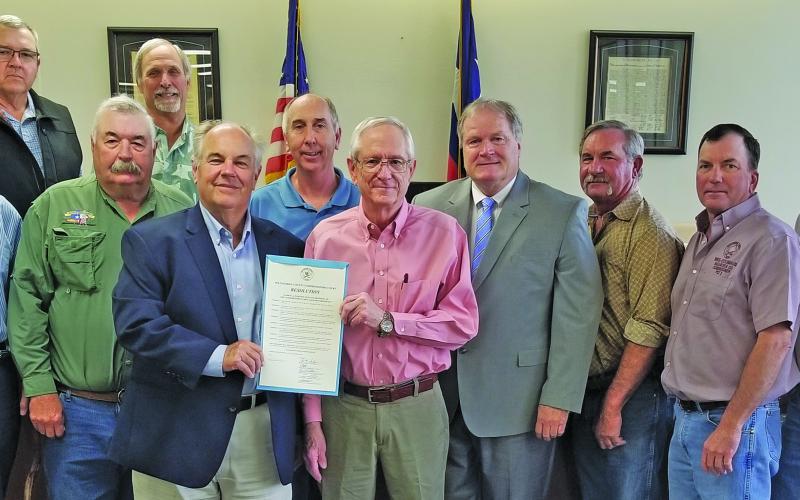 Sentinel Photo/Mike Reddell Former elected officials and business leaders were at a recent Commissioners Court meeting to show their support for the court to approve a resolution for naming a portion of Texas 35 as “Congressman Greg Laughlin Highway.” The resolution was approved unanimously.