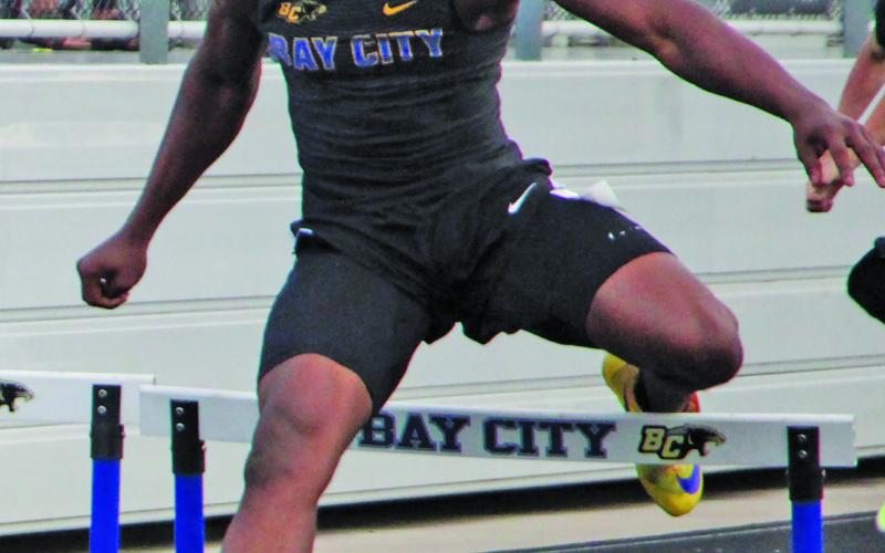 Sentinel Photo/Mike Reddell Blackcat hurdler Jaylen Harris shows his intensity at district track meet.