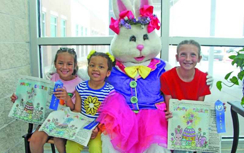 Sentinel Photo/Jessica Shepard This year's Bay City Sentinel Easter Coloring Contest winners are, from left, Maggie Dean, Aubree Johnson, and Emma Kubecka. Each winner received a blue ribbon for their artistry and an Easter basket full of treats.