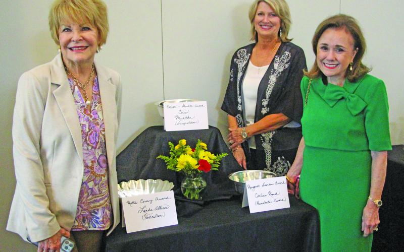 Sentinel Photo/Jessica Shepard Winners of the Garden Club Floral Show's "Celestial Garden" competition were recognized at the show's presentation evening event on April 16. Those winners, from left, are Linda Allison, Carlisa Krenek, and Cerie Muecke. Show winners were chosen based on their horticulture specimens and several unique floral arrangement designs.