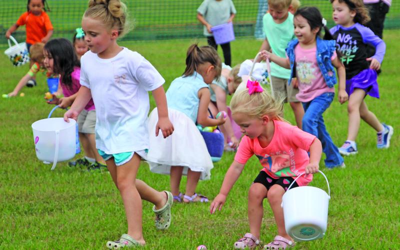 Sentinel Photo/Jessica Shepard Dozens of four-year-old Bay City residents scrambled to fill their Easter baskets with eggs during Bay City Parks &amp; Recreation Department's "Annual Easter Egg-Stravaganza" in LeTulle Park on Friday, April 3.