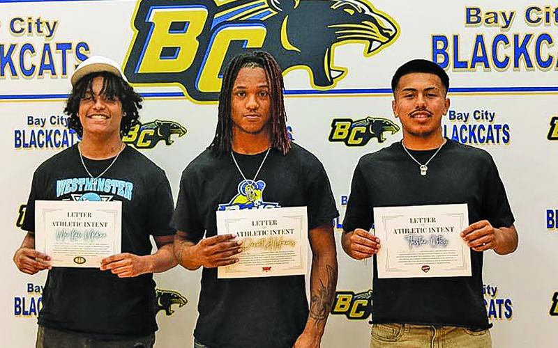 Contributed photo Three BCHS athletes - from left, Mar’kale Medina, Davont’a Harris and Tristan Ortiz - signed college commitments last week. Mar’kale Medina committed to Arkansas Baptist College to play football. Davont’a Harris, inked with Texas Wesleyan University to continue his education and football career.  Tristan Ortiz committed to Jarvis Christian University, where he plans to continue playing soccer while pursuing a degree in Kinesiology.