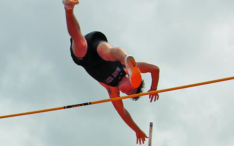 Sentinel Photo/Mike Reddell Bay City pole vaulter Ty Schneider clears the top bar at the Van Vleck Pre-District Warm-up meet last week.