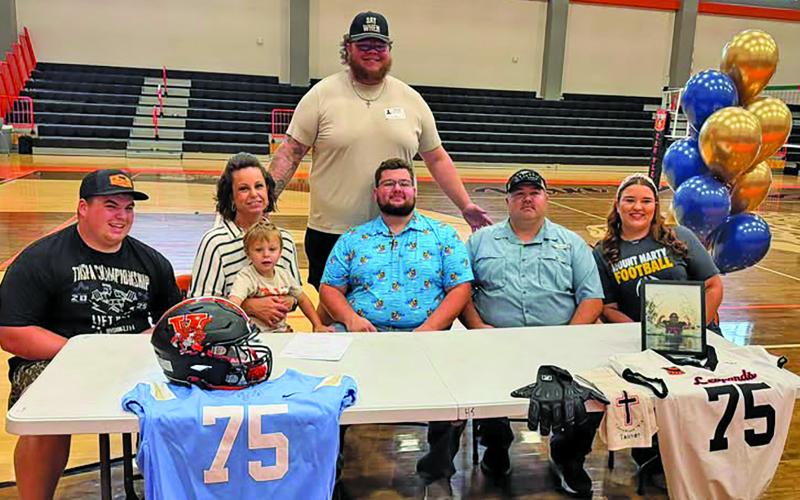Van Vleck Leopard football player Tanner Arrington recently signed to continue his football career at Mount Marty University in South Dakota. A recent signing ceremony was part of the recognition. Contributed photo