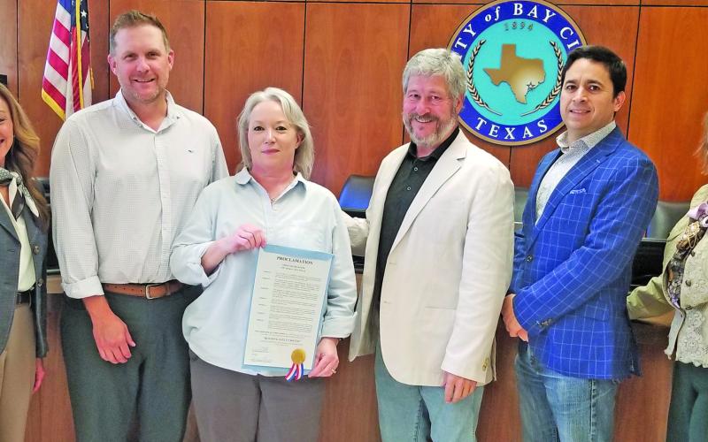 Sentinel photo/Mike Reddell A City Council proclamation last week designated the month of May as Building Safety Month. Assistant Public Works Director Krystal Mason shows off the proclamation.