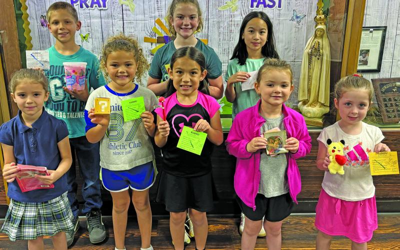 Holy Cross Catholic School Photo Eagles of the Week: Luke Novak, Maryclare Bricker, Nadia Flores, Allyine Frick, Zina Wilkenson, Bianca Gomez, Adelyn Sutherland, and Emilia Ursery.