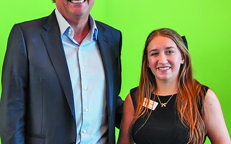 Tenaris photo Tenaris US President Guillermo Moreno presents the Student of the Year Award to Makayla Alford from Van Vleck High School at ceremonies May 20.