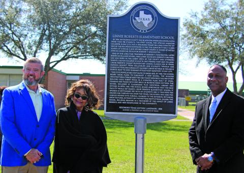 Sentinel Photo/Mike Reddell A state historical marker as a Texas Landmark building was dedicated at the old Linnie Roberts Elementary Saturday, Feb. 11. Shown, from left, are: BCISD Superintendent Dr. Dwight McHazlett, Linnie Roberts’ granddaughter Cheryl Roberts Owens and BCISD Police Chief Leroy Cunningham, a former student.