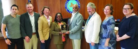 Sentinel Photo/Mike Reddell Outgoing City Council Member Floyce Brown was recognized for her years of service at City Council’s regular meeting June 13. Shown are, from left, City Councilmen Ben Flores, Blayne Findlay, Bradley Westmoreland, Brown, Mayor Robert Nelson, Mayor Pro Tem Jim Folse, Council Member Becca Sitz and City Manager Shawna Burkhart.