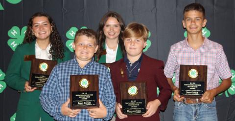 Sentinel Photo/Jessica Shepard Bronze, Silver, and Gold Star awards were presented to outstanding 4-H club members in their given divisions during the annual 4-H banquet Thursday, July 20. Those recipients are: back row from left: Victoria Sliva and Ansley Kubecka; front row, from left, Jeret Girndt, Drayson Saha and Jace Girndt. Kacey Kubecka is not pictured. See Page 8 for more 4-H award winners.