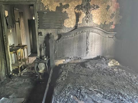 Dan Shook Photo The fire was contained to the house’s bedroom.