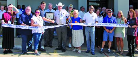 An estimated 70 people attended the grand opening of new Bay City studios and officers for 96 FM Country, 92.5 Happy Radio and 102.5 FreshRadio at 3600 Ave. F Wednesday, Aug. 9. The event gave people the chance to meet members of the Bay and Beyond Broadcasting team. Sentinel photo Mike Reddell