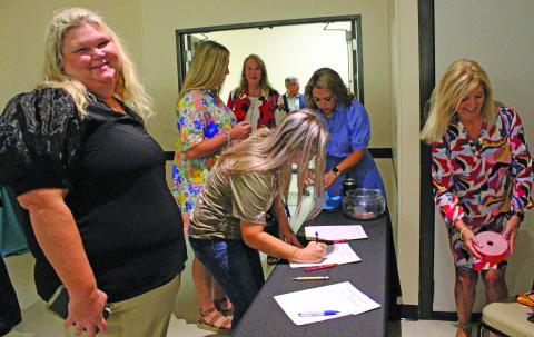 Sentinel Photo/Jessica Shepard Several new teachers check-in and got handed a door prize ticket as the Bay City Chamber of Commerce & Agriculture hosted its 37th Annual "New Teacher Breakfast' last Friday, Aug. 11. New teachers from Bay City, Van Vleck, and Matagorda ISD showed up to be recognized and supported by local businesses and private individuals. 