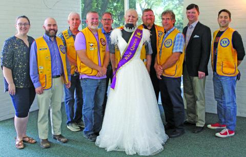 Sentinel Photo/Jessica Shepard Bay City Lions Club members pose with this year’s Rice Festival Queen dress, sponsored by OQ Chemicals on Sept. 8. From left are Pageant Director Rachel Ricks, Pageant Chairman Ryan Ricks, Mike Finster, Chris Hadash, Dan Shook, Doc Campbell, Chad Craft, David Krenek, Eric Wright from OQ and Ben Flores. The dress and crown are from "New Beginnings" in El Campo and also feature jewelry from Green Bros. Jewelers.