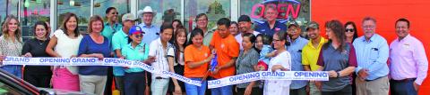 Sentinel Photo/Jessica Shepard Master Glazed Donuts partnered with the Bay City Chamber of Commerce & Agriculture to celebrate its grand opening with a ribbon-cutting ceremony Wednesday, Sept. 6 at the shop. The donut shop is located at 4206 7th St. in Bay City.
