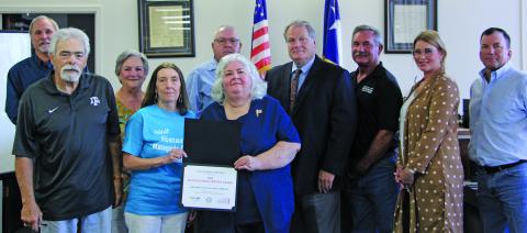 Photo/Crystal Morones Matagorda County Historical Commission members joined Commissioners Court as the county presented MCHC with the Texas Historical Commission Distinguished Service Award.