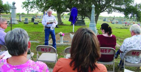 Sentinel Photo/Mike Reddell Rik Stanley reads Selkirk biography.