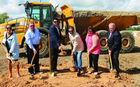 Sentinel Photo/Mike Reddell Groundbreaking for the Russell Ranch Subdivision Monday, Oct. 23, included, from left: Jessica Russell, BCCDC executive director; Jim Maddox, the subdivision developer; Zee Momin and Moez Momin, both connected with the project; City Manager Shawna Burkhart; and County Judge Bobby Seiferman. 