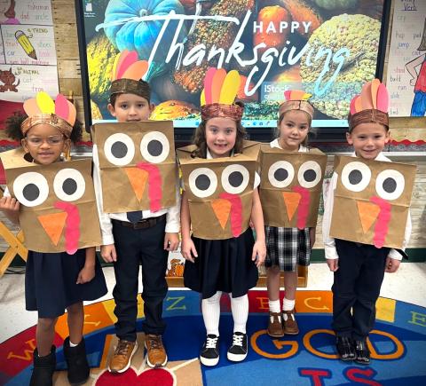 Contributed photo Holy Cross Catholic School's first grade class performed two plays, sang a song, and shared videos about what they’re thankful for.