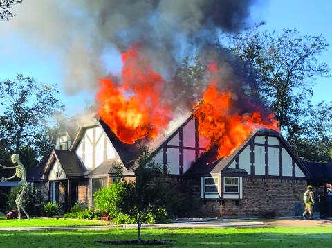 Contributed photo Flames engulf a Shadow Lane house Nov. 15 that caused $400,000 in damages. The family wasn’t home.