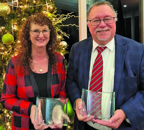 Contributed photo Chrystal Folse received the Tiger Lane community spirit award and Mike Ferdinand the George Holst Award at MCEDC’s annual meeting Dec. 13.