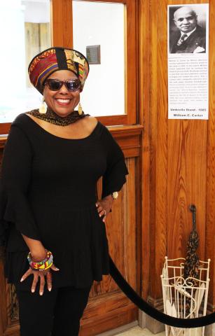 Donnye Stone, above, stands at the entrance of her annual "Black History Month" exhibit at the Matagorda County Museum. Stone's exhibit is on display in the museum's lobby until Wednesday, Feb. 28.