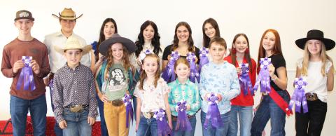 Sentinel Photo/Jessica Shepard Matagorda County Fair and Livestock Association's Home Economics food entry winners received purple rosettes for their win as Grand Champions of their chosen divisions Saturday, Feb. 24. Winners include Cole Baker, Truitt Foltyn, Drake O’Connoll, Kathryn Rodgers, Meredith Jones, Ruby Bonnot, Ryleigh Siptak, Ashley Alford, Aribella Carson, Barrett Botbyl, Jace Reynolds, Karoline Murray, Savannah Remmy, Kaitlyn Gilbert, Kaylee Spencer, and Ava Bowers. 