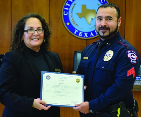 Chief Christella Rodriguez with Sgt. Marino Chavez