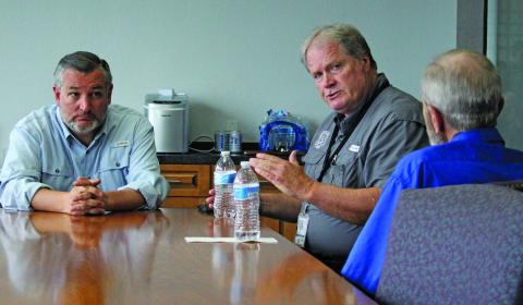 Sentinel Photo/Jessica Shepard U.S. Senator Ted Cruz, left, visited with city and county officials about Hurricane Beryl’s destruction Monday afternoon. 