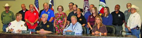 Acting Governor Dan Patrick, County Judge Bobby Seiferman, State Senator Joan Huffman, and Texas Department of Emergency Management (TDEM) chief W. Nim Kidd take part in Beryl news conference at the CED Wednesday, July 10..