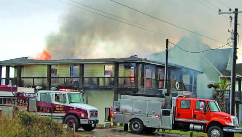 Sentinel Photo/Mike Reddell Several Matagorda County volunteer fire departments rushed to help Sargent VFD in battling a house fire at the 900 block of Canal Thursday morning, July 11. Assisting were Bay City VFD, Van Vleck VFD, Wadsworth VFD, and Matagorda VFD.