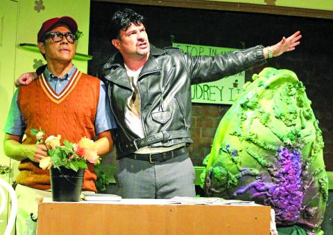Sentinel Photo/Jessica Shepard Seymour Krelborn (Ray Garcia) left, gets visibly uncomfortable listening to Dr. Orin Scrivello, DDS (Todd Bonny), right, trying to persuade him into a new partnership for more fame and notoriety of his Audrey 2 plant during CAST's press night Aug 1. That scene is one of many in the comedic musical "Little Shop of Horrors" being showcased this week Thursday-Saturday, Aug. 8-10.