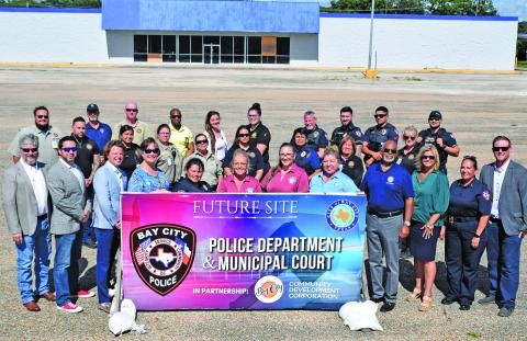 Courtesy photo City Council members, Bay City Police Department and Municipal Court employees gather in front of the new site for the Police Department and Municipal Court