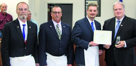 Sentinel Photo/Mike Reddell Bay City Masonic Lodge 865 presented County Judge Bobby  Seiferman a Community Builders Award at Commissioners Court meeting Monday, Aug. 26.