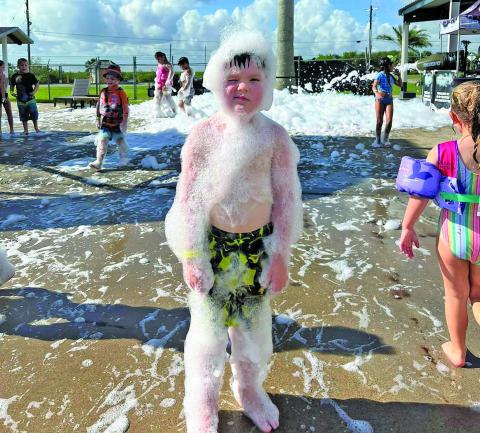 Courtesy photo Bay City YMCA observed the rapid approach of school with the last field trip of the summer - a foam swim party.