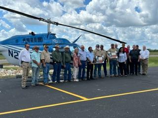 Two AEP crewmen and a Westwind helicopter pilot were honored for helping save a Blessing area man who the crew saw lying in a pool of blood on his property after Hurricane Beryl landed. The crewmen, Ronald “Cole” Overcash and Joel Hilburn, saw Edward Gurecky on his driveway, and pilot Marcus Perez immediately landed the helicopter and acted quickly to help Gurecky. The two crewmen and pilot were honored at a ceremony at Bay City Regional Airport Wednesday, Sept. 18.   Renee Chollett photo