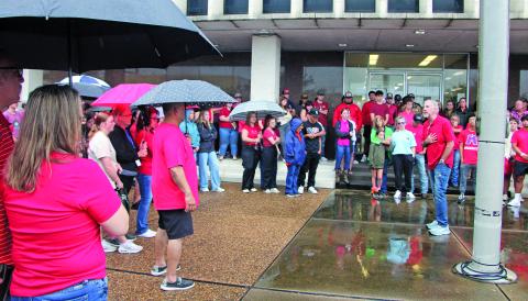 Sentinel Photo/Mike Reddell About 175 people attended a community prayer vigil for the two females who were killed in a car crash in Van Vleck Sept. 2. Lane ParDue of Calvary Baptist Church delivered the message of comfort for those attending.