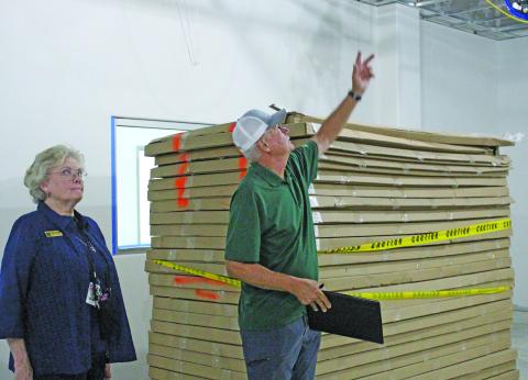 Sentinel Photo/Jessica Shepard Wharton County Junior College WCJC Facilities Management Advisor Mike Feyen, right, points out where carpentry workstations will be located during a recent walk-through tour of the college's new trades and carpentry expansion. 