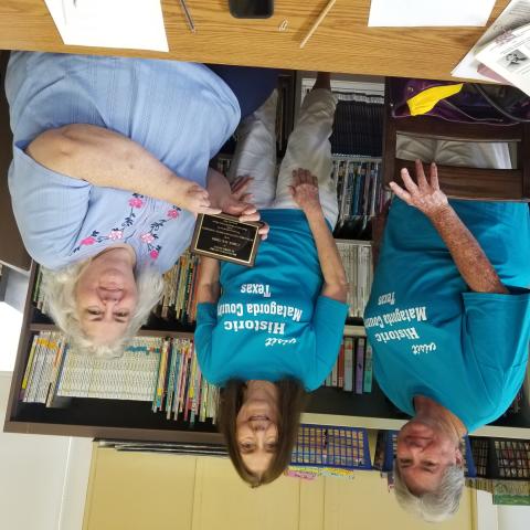 Matagorda County Historical Commission Chairperson Carol Gibbs, right, received a Recognition Award in Appreciation “for your exceptional service in Preservation of Matagorda County History 2024. Presenting the award were (MCHC) board members Deean Griffith, far left, and Jennifer Bishop. The award was presented at the commission’s September meeting. Sentinel Photo/Mike Reddell