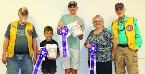 Sentinel Photo/Jessica Shepard 2024 "Rice Dish Roundup" grand champion winners were chosen from each respective age division on Tuesday, Oct. 15 From left are Carter Busby, Joseph Machacek, and Kathy Jackson. Not pictured is Austin Machacek. Winners were joined by Bay City Lions Club member Tim Hall and Rice Dish chairman Wayne Witte. 