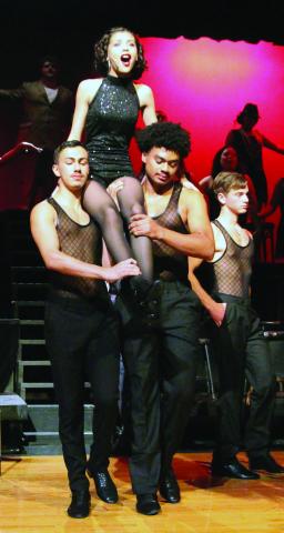 Sentinel Photo/Jessica Shepard Bay City High School Dungeoneers run through the first musical number in"Chicago: Teen Edition" at dress rehearsal Monday night. The jazz-centric musical production still has $10 pre-sale tickets available for its Nov. 9-10 and 12 shows online at https://dungeoneers.ludus.com/index.php. 