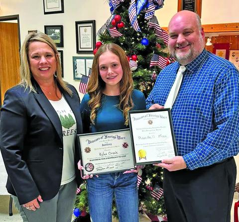 VVISD Photo The VFW Post 2438 of Matagorda County recognized Randall “Randy” Mau of Van Vleck High School as Teacher Of The Year and Van Vleck Junior High 8th grade student, Kylee Orsak, for her excellence in The Patriot’s Pen Youth Essay Competition. From left,VVISD Superintendent, Christie Dement - VVJH Student, Kylee Orsak - VVHS Teacher, Randall “Randy” Mau at the VFW Award Ceremony.